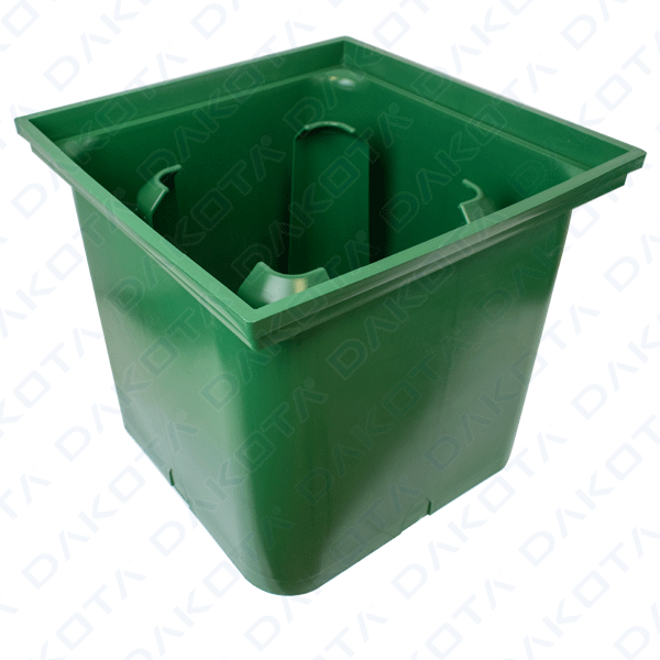 Green manhole 400 x 400 prepared for irrigation pipe
